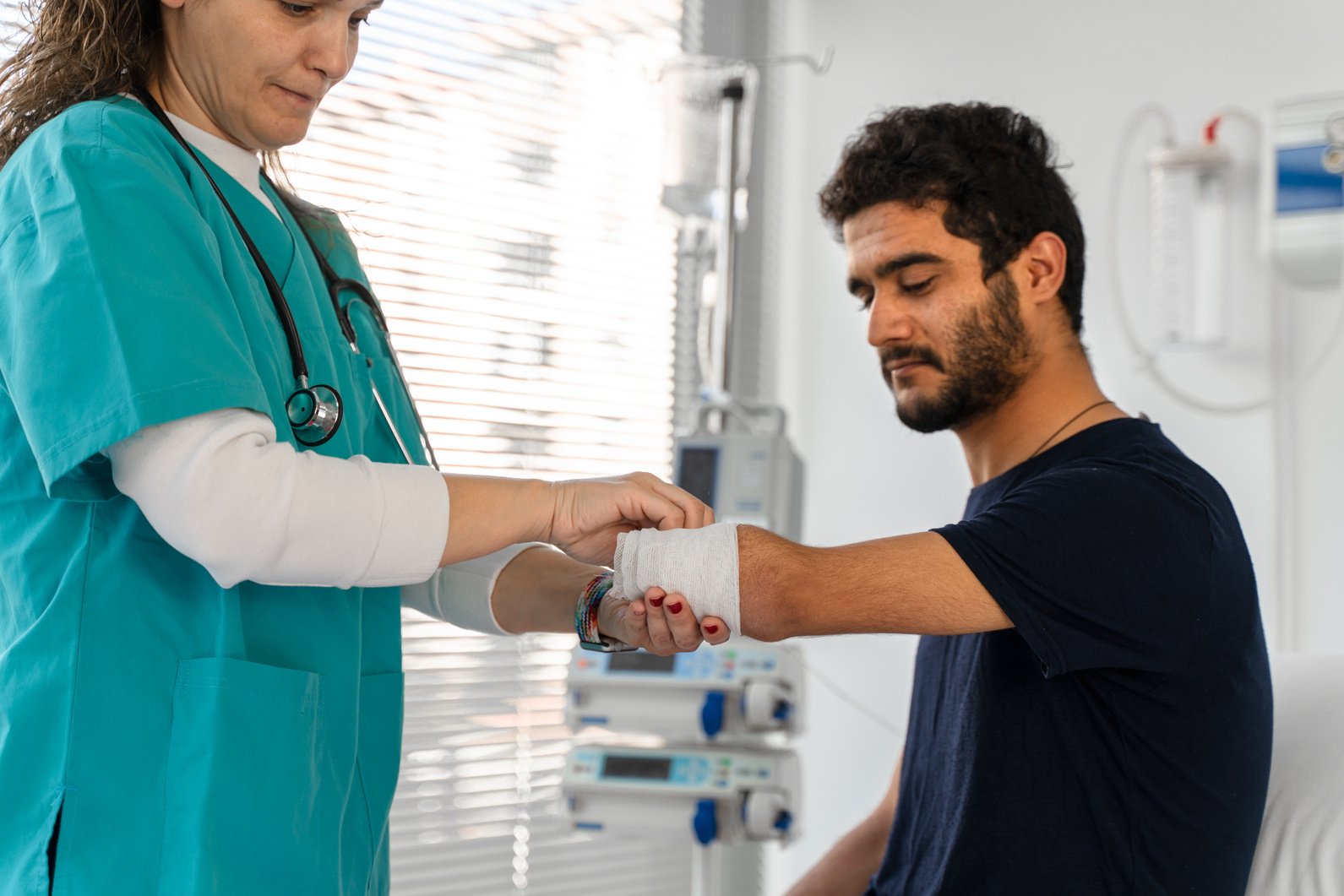 Doctor Wrapping Bandage On  Arm amputation